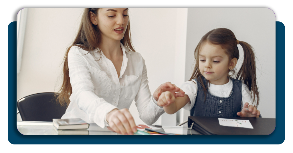 Tutor helping a child study at home for school support services
